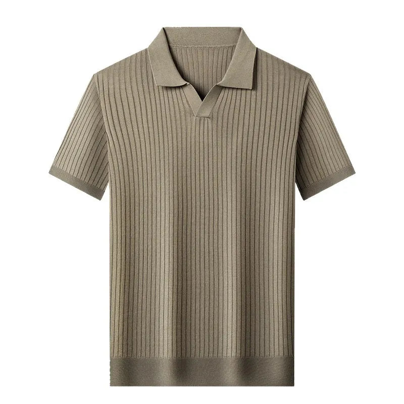 Man wearing a black and white striped mulberry silk T-shirt with a lapel collar.