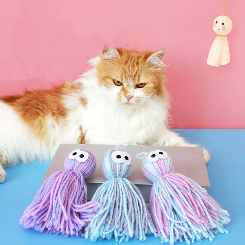 Wool ball cat toy hanging with blue grey colour and 10cm dimensions for teeth grinding play