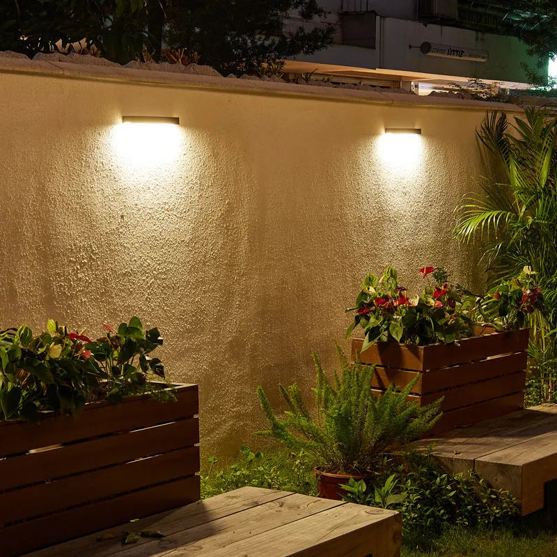 Solar outdoor wall lamp with black ABS plastic shell and IP65 waterproof rating