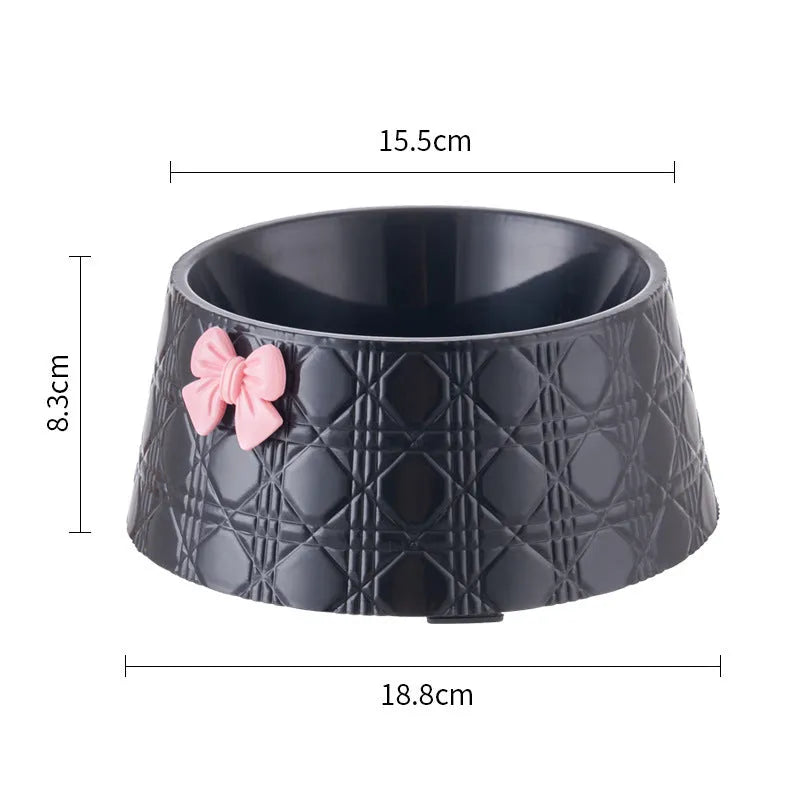 Set of four pet food bowls with bowknot design and diamond pattern in pink, silver, black, purple, and white colours.