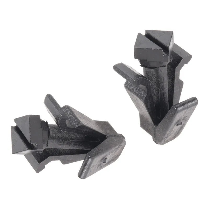 Black plastic Nissan bumper cover radiator grille fastening clip with part number 76882-0M060