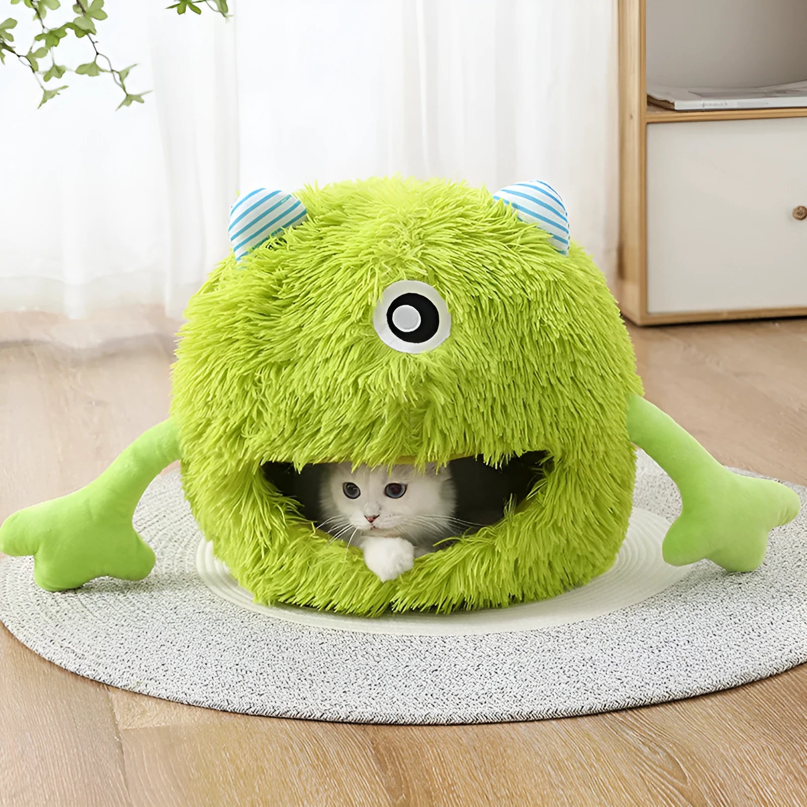Fluffy round cat bed with non-slip base in three sizes for indoor cats and small dogs