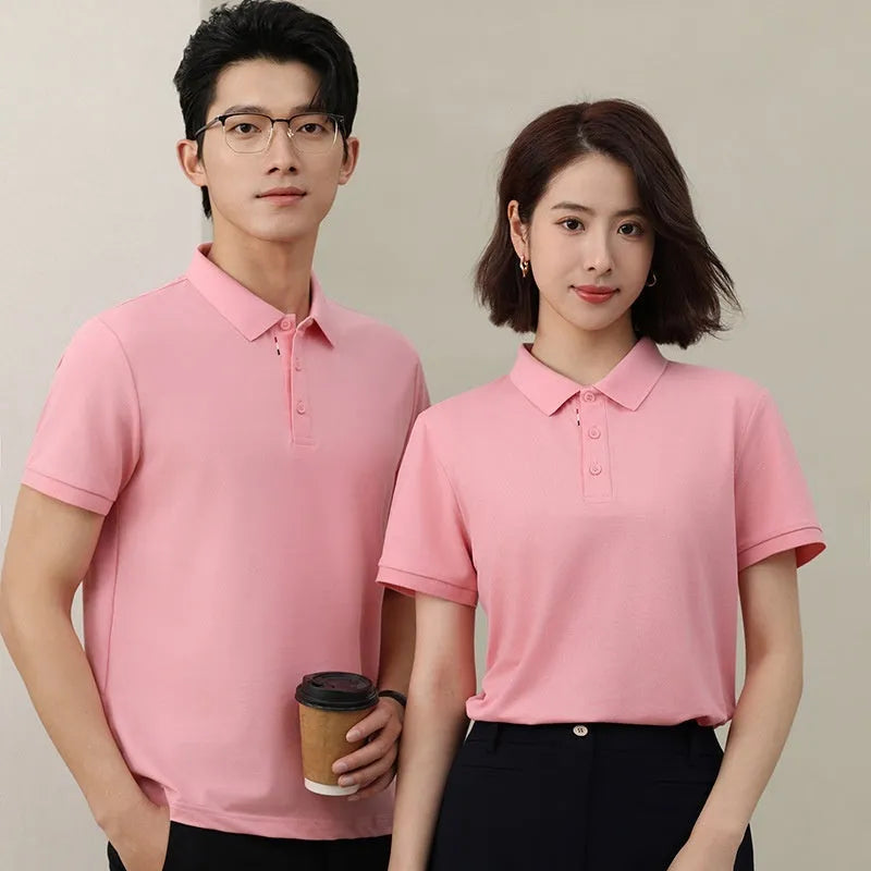 Solid colour short sleeve catering work polo shirt on a hanger, available in multiple colours and sizes.