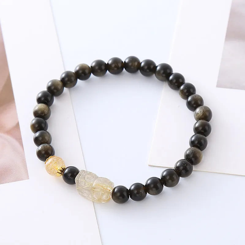 Handmade natural obsidian pi xiu bracelet with retro ethnic style, gold obsidian or red flower colour options