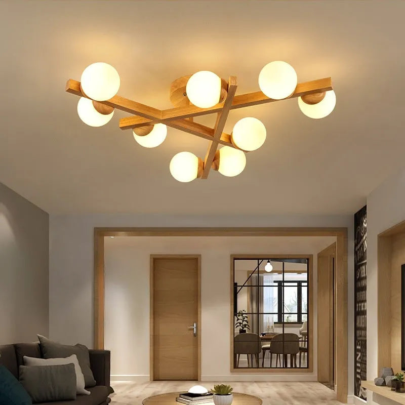 Modern wooden-style Nordic ceiling light fixture with three adjustable heads.
