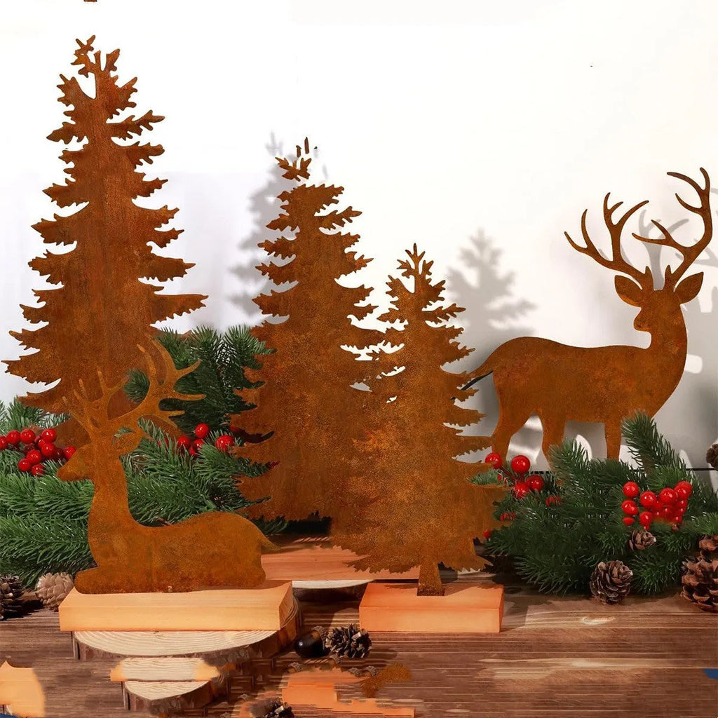 Three rusty metal Christmas ornaments featuring elk and tree silhouettes on a white background