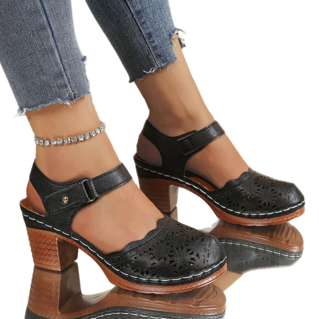 Women's hollow-out chunky-heel closed-toe sandals in black with Velcro strap and rubber outsole