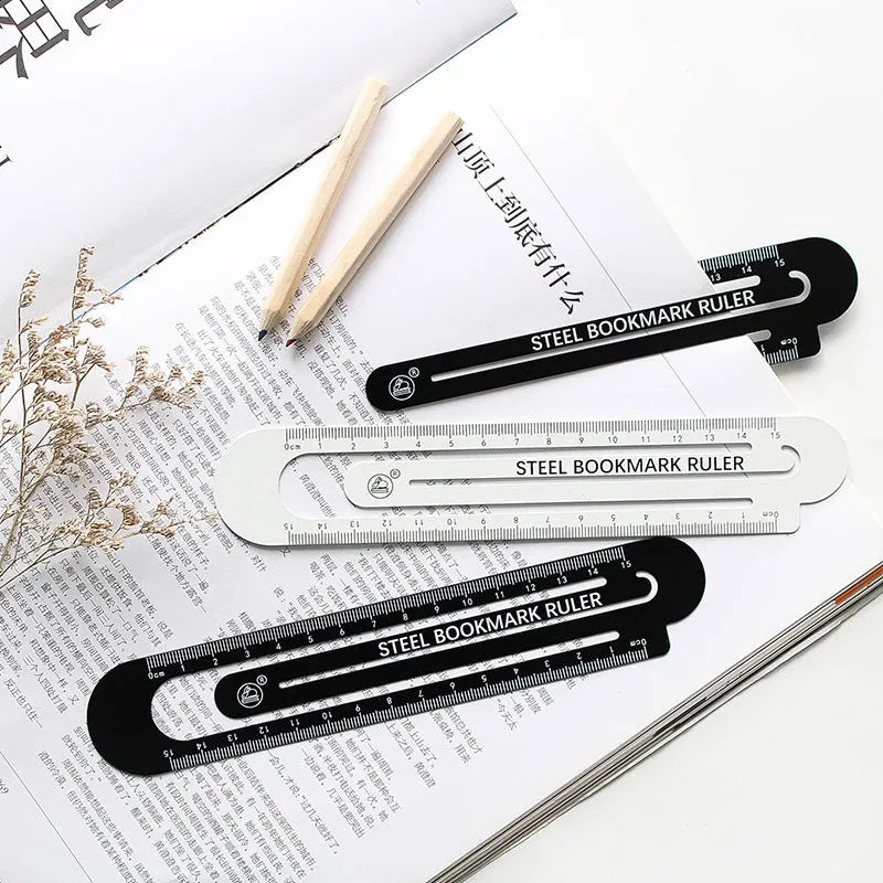 Black and white two-sided steel ruler measuring 12cm in length