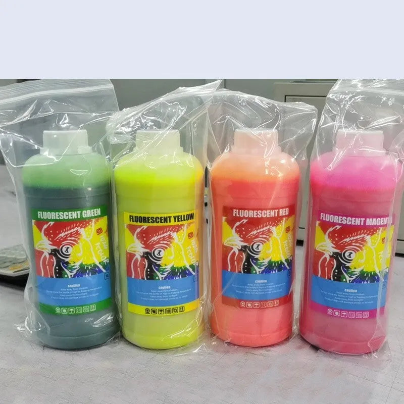 Bottle of fluorescent red pigment ink for PET film sublimation and screen printing.