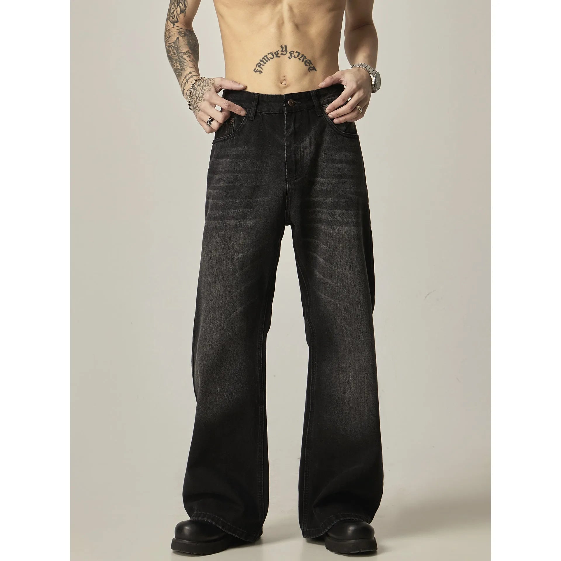 Black loose straight leg jeans with American retro styling and zipper fly front.