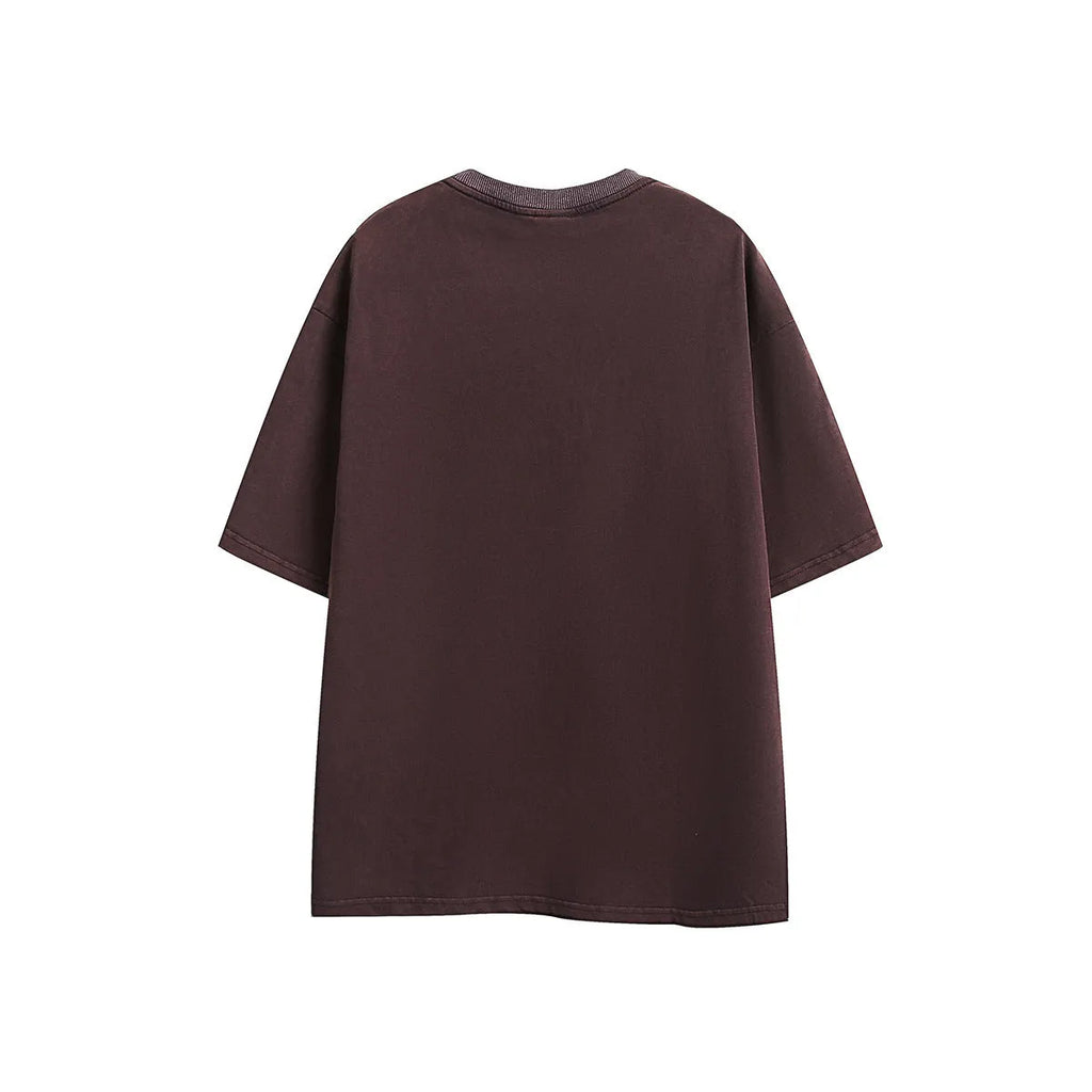 Men's loose fit purple cotton short-sleeved t-shirt with embroidered detail and a washed retro finish.
