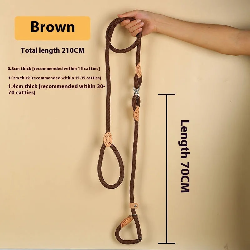 Brown nylon dog leash with a metal P-chain clip and a braided hand holding rope, shown at full 2.1 metre length.