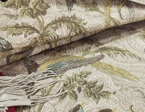 Blue American style floral bird quilted cotton bedspread set on a bed