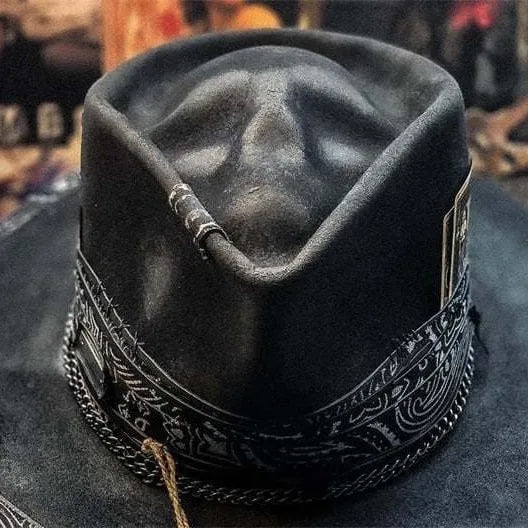 Handmade wool felt skull hat with a conical crown, shown in the colour Skull Hat.