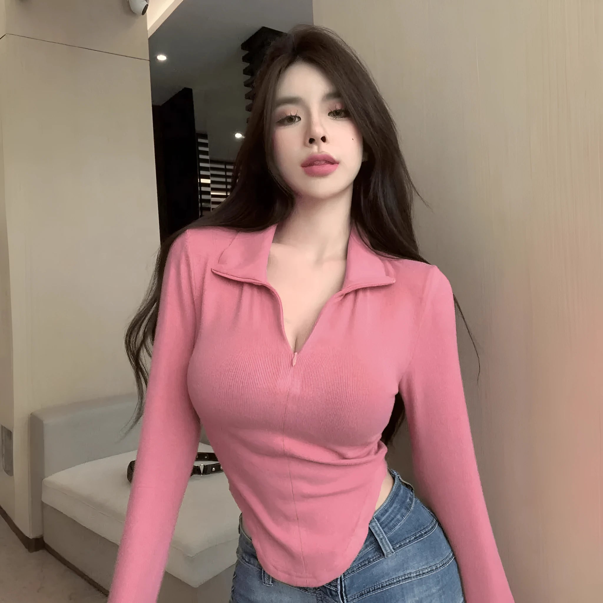 Women's slim fit stand collar long-sleeved t-shirt in peach colour, polyester knit, front view