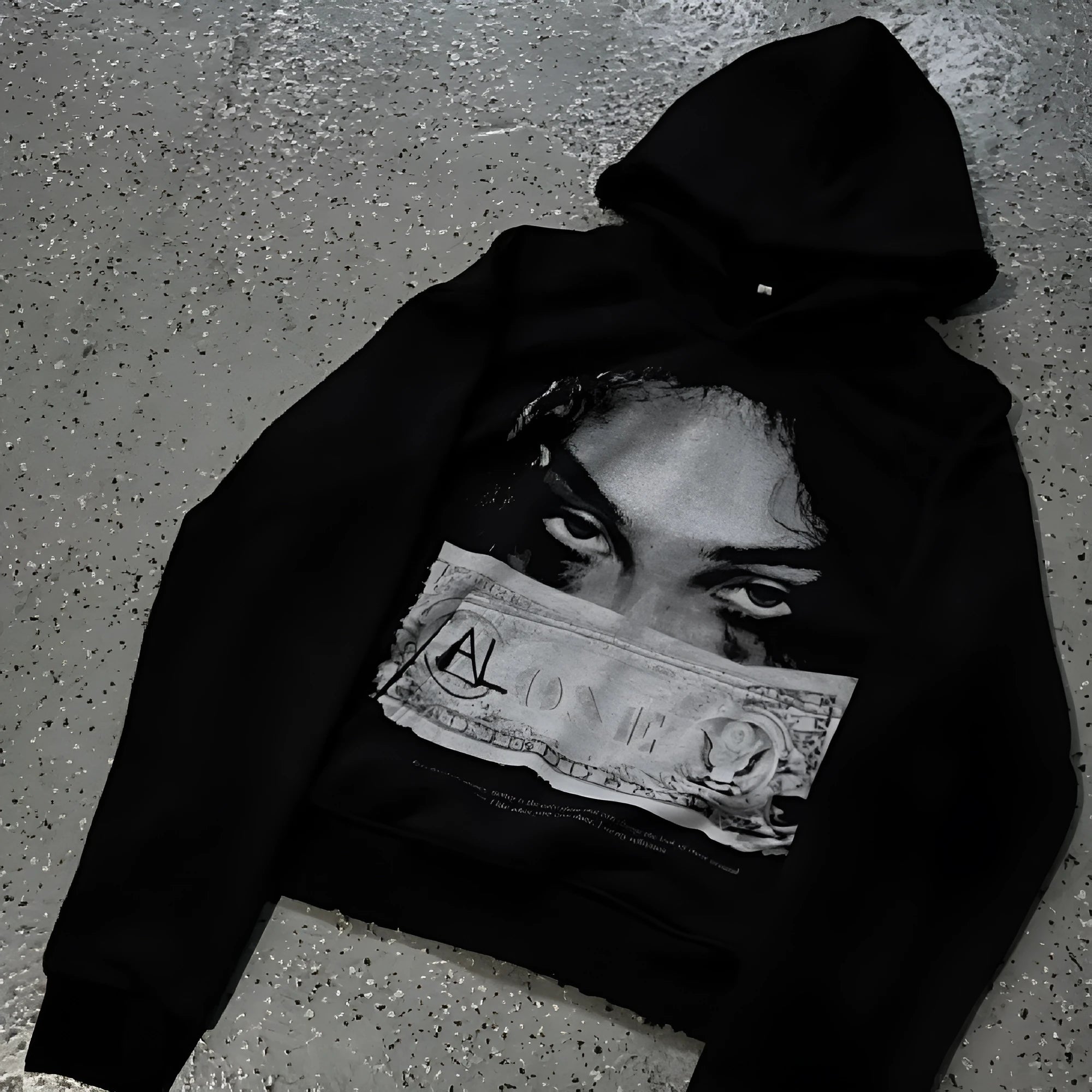 Women's black hoodie with a cartoon pattern print, loose fit.