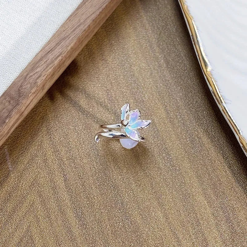 Adjustable copper ring with insect motif and dripping oil colour finish.