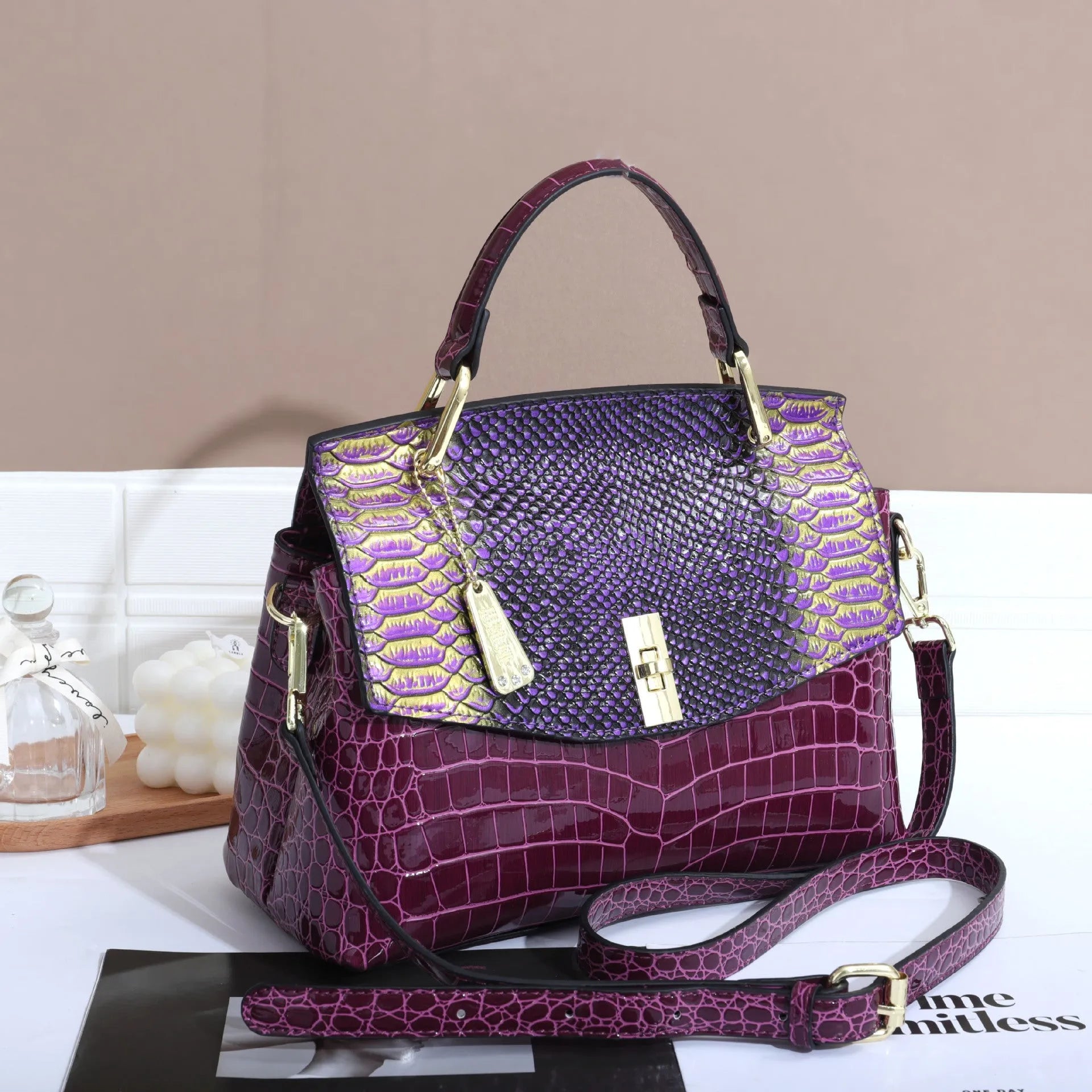 Women's crossbody handbag with crocodile and snake patterns in blue, green, orange, purple or white colours