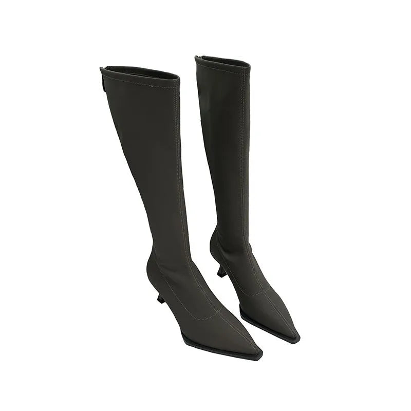 Black women's below-the-knee boots with a pointed toe, stiletto heel, and back zipper.