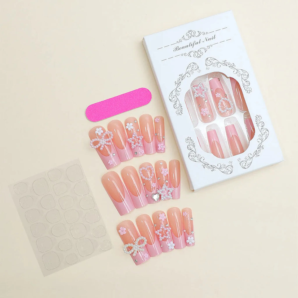 Decorative false nails with extended water pipe French tips, bow detailing and diamond accents in colour XB-70-48