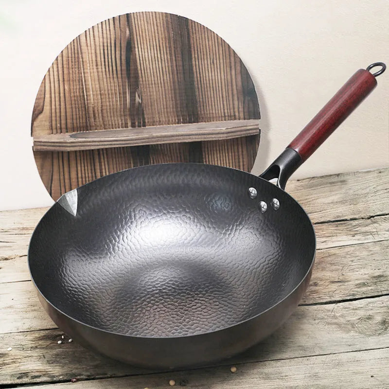 Traditional black iron wok with wooden handle, 40cm diameter, induction base, no chemical coating