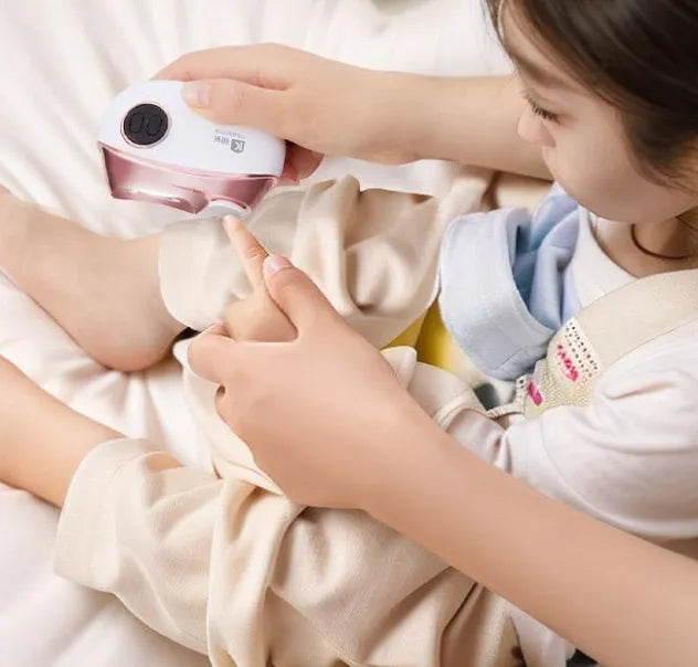 Electric nail clipper and polisher two-in-one device in blue, orange and white colours with Type-C charging cable