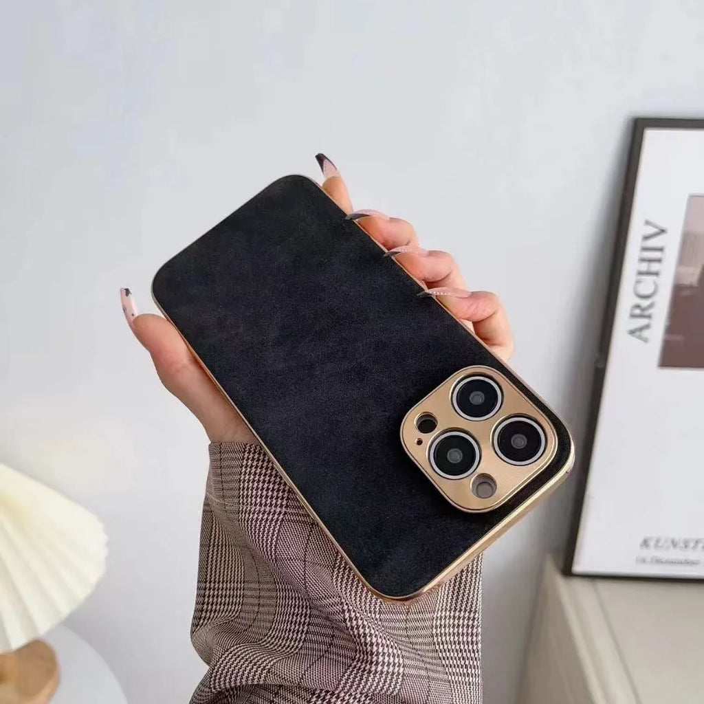 Solid colour leather texture TPU phone case for iPhone on a table, showing grey-green colour option.
