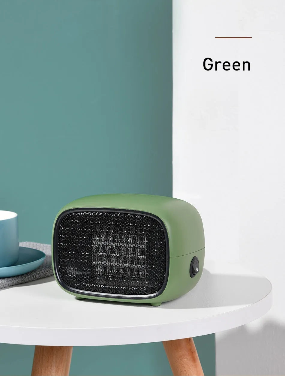 Compact green mini heater with PTC ceramic heating, 500W power, and flame-retardant ABS construction