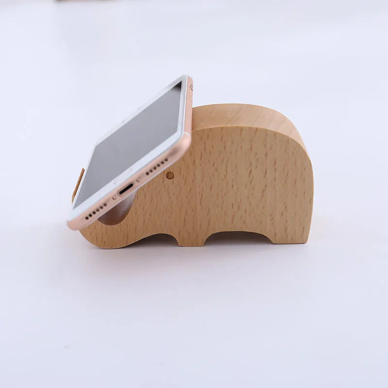 Resin lazy phone holder bracket with carved novelty design holding mobile phone upright