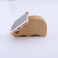 Resin lazy phone holder bracket with carved novelty design holding mobile phone upright