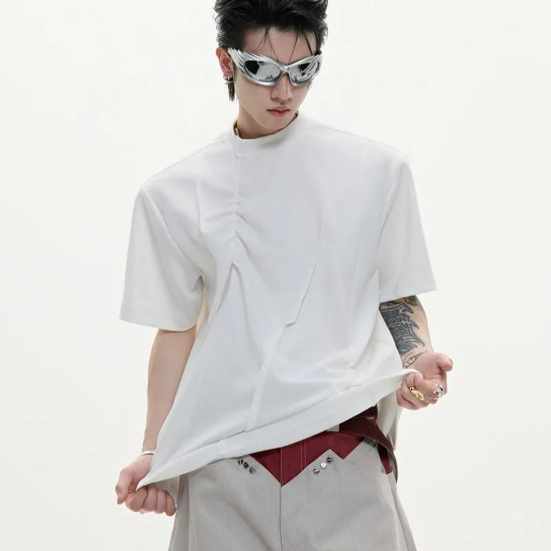 Men's loose fit grey cotton t-shirt with a textured pleated design and round neck.