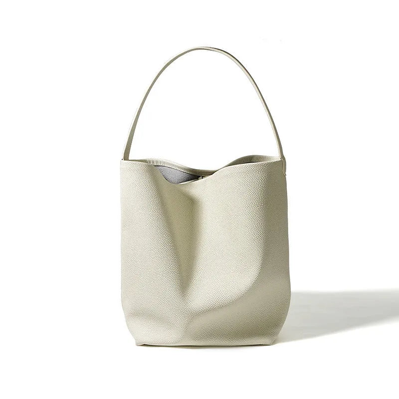 Genuine leather bucket bag for women in beige, large capacity, with open pocket and patchwork design, shoulder style