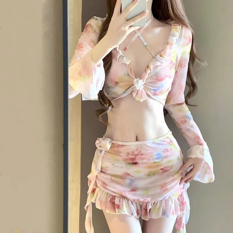 Women's floral bikini swimsuit in cherry blossom pink on a mannequin