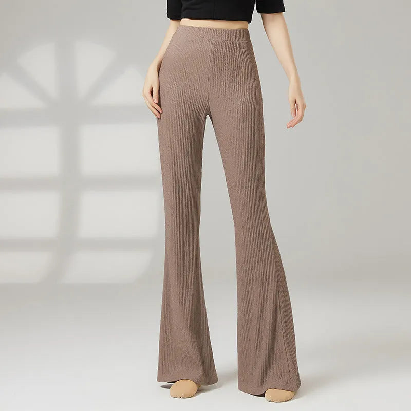 Women's solid colour dance practice trousers in polyester fabric, shown in beige apricot.