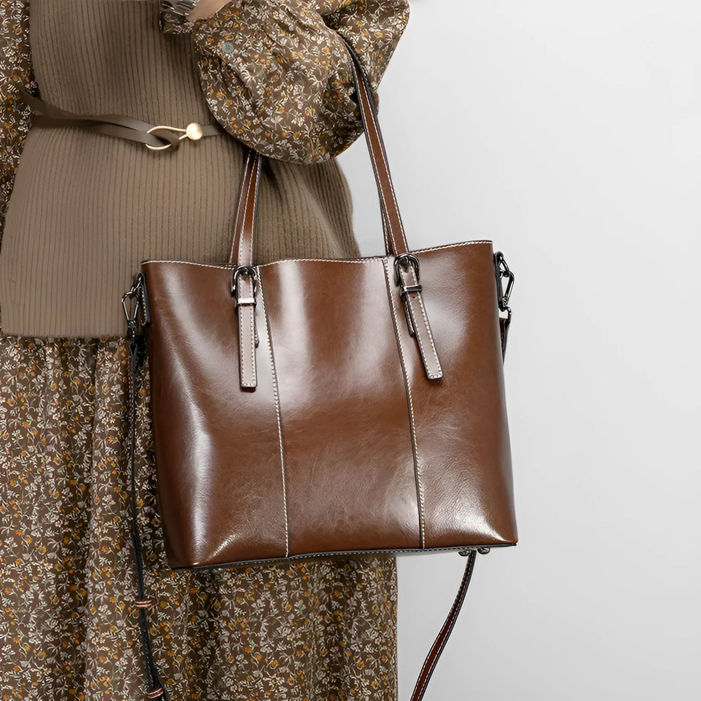 Genuine leather women's retro shoulder bag in brown with multiple compartments and straps