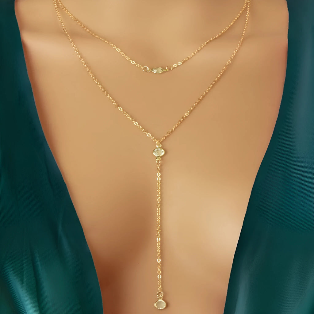 Alloy geometric pendant necklace with electroplated gold finish and O-ring chain on woman