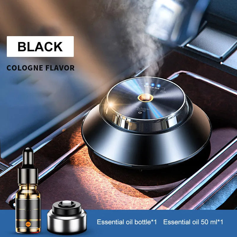 Black car aromatherapy diffuser with metal butterfly design and USB power cable for vehicle use