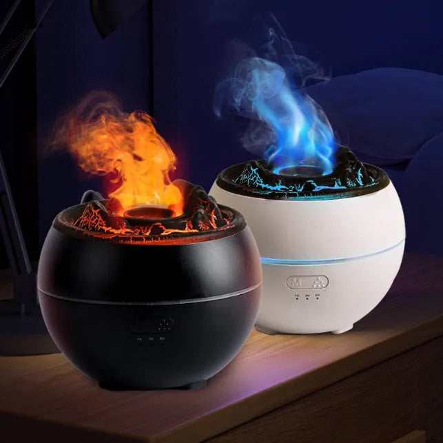 White round desktop flame aroma diffuser and humidifier with USB plug on a wooden table.