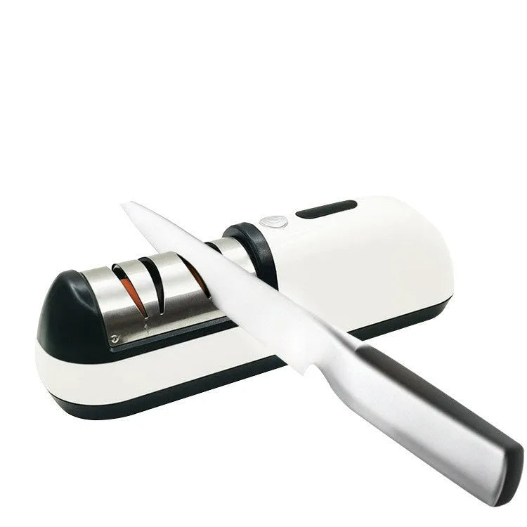 Rechargeable electric knife sharpener with ABS body and stainless steel components on a kitchen counter