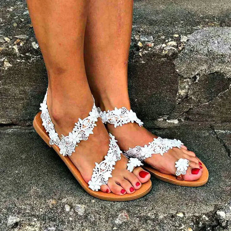 White rhinestone floral plus-size womens flat sandals with round toe and slip-on design