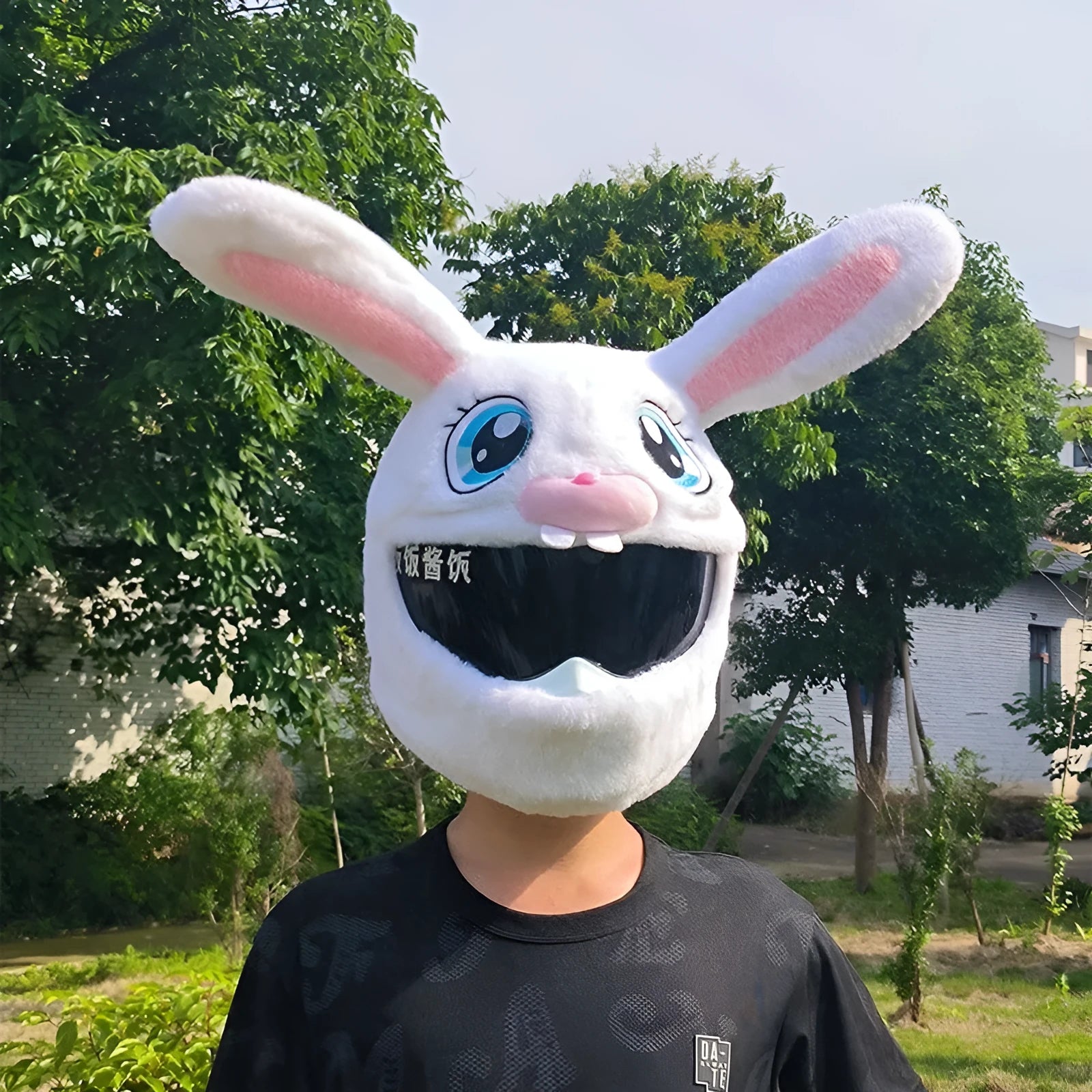 White rabbit head plush helmet cover for electric motorcycles on a helmet.