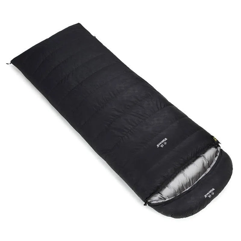 Black outdoor sleeping bag with envelope structure, filled with white goose down.