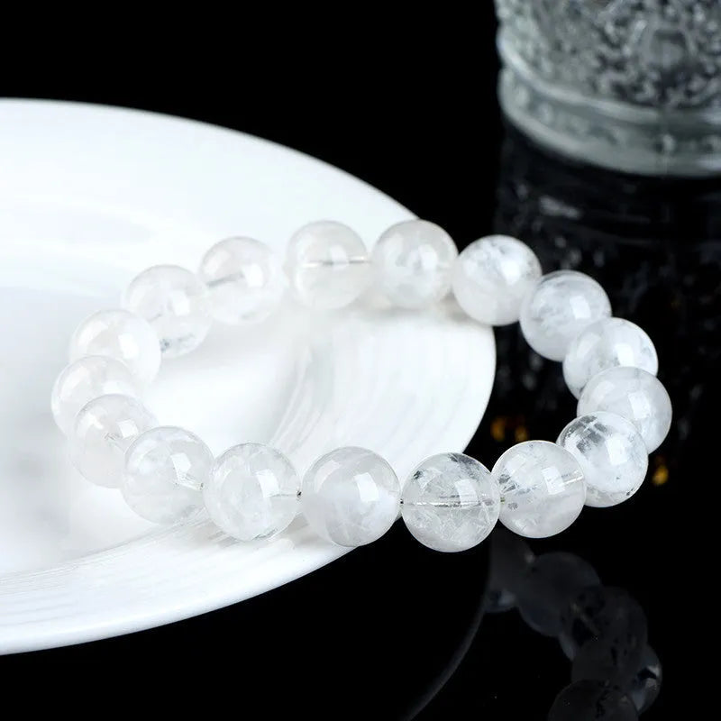 Natural blizzard snowflake crystal bracelet with round geometric beads and traditional Chinese elements