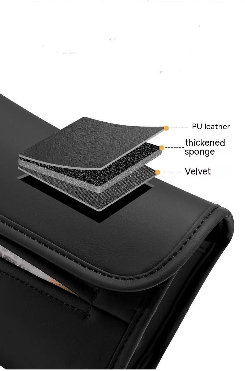 Leather car tissue box organiser with elastic band mount for sun visor or armrest.