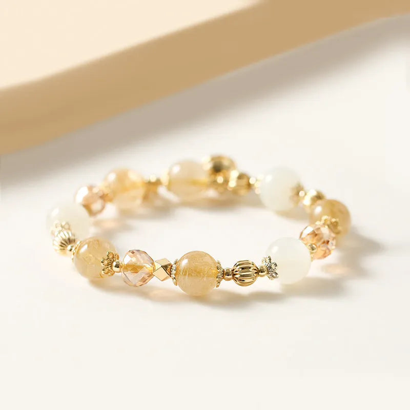 Gold electroplated rutilated quartz crystal bracelet with Korean style design