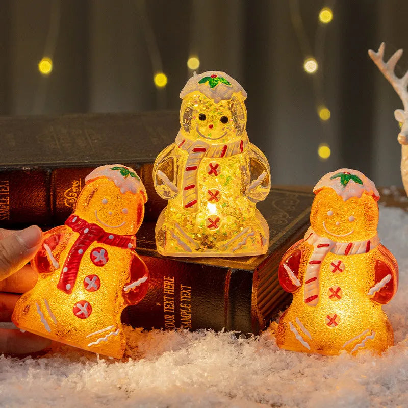 Glowing plastic gingerbread snowman Christmas ornament with a red scarf