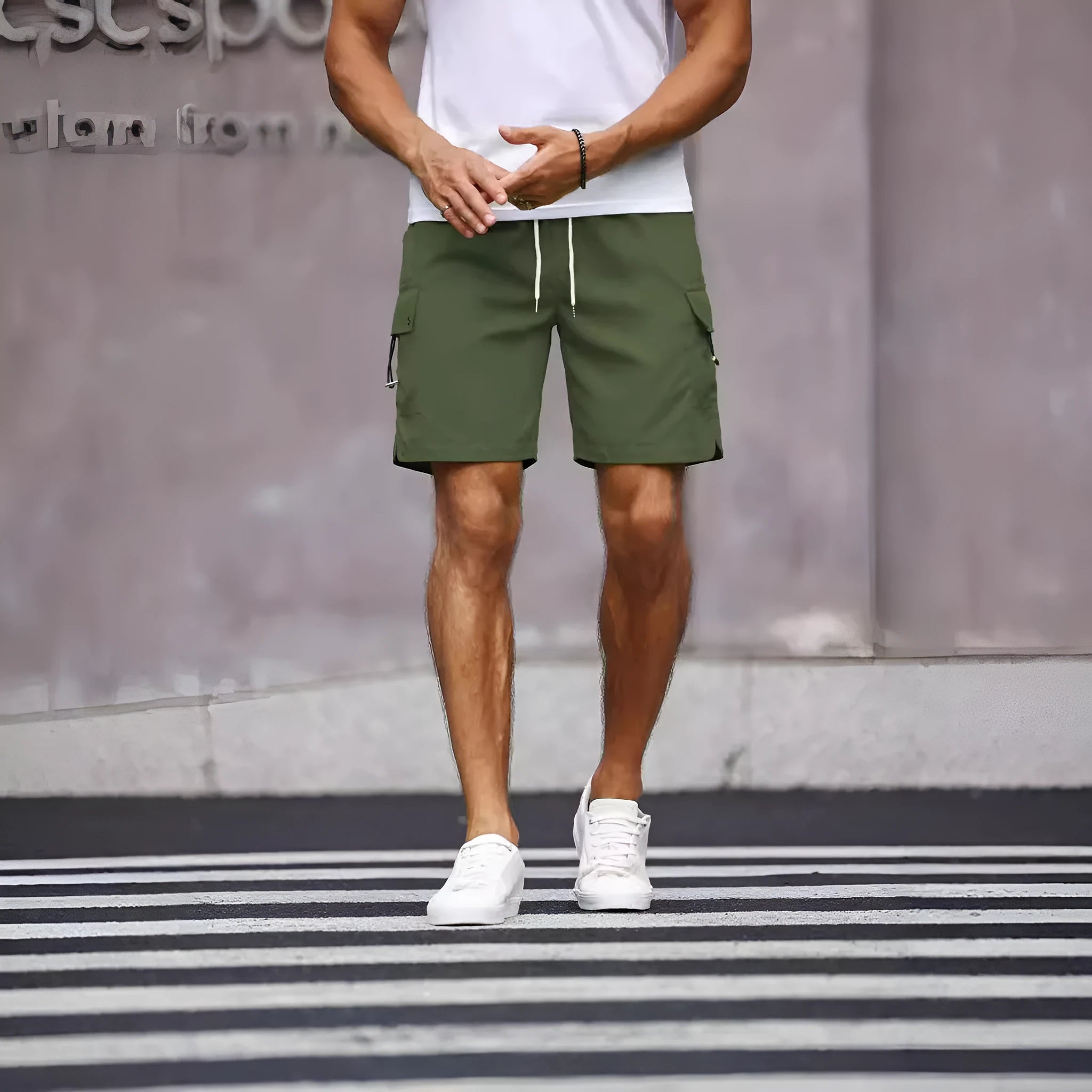 Men's loose-fitting army green workwear shorts made from cool silk cotton fabric.