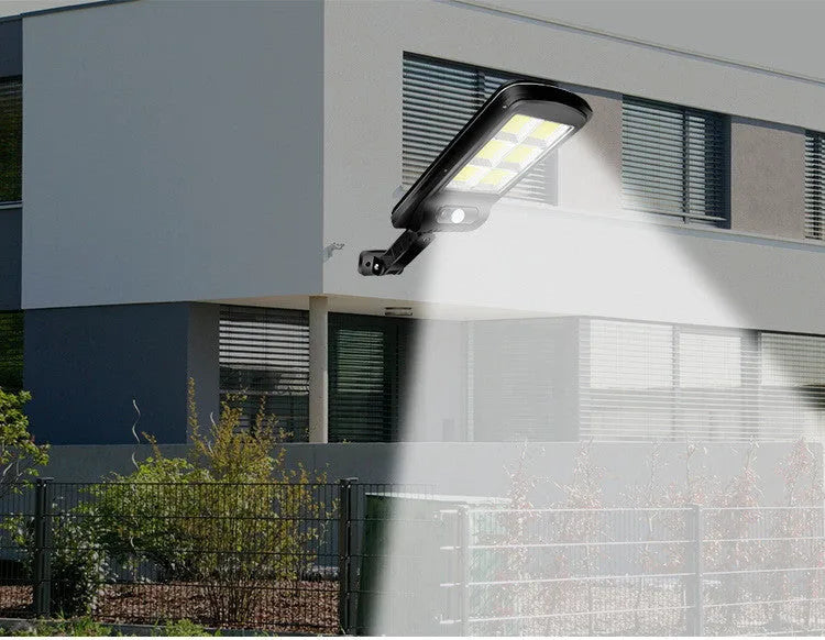 Black solar motion sensor light for outdoor security with IP65 waterproof rating