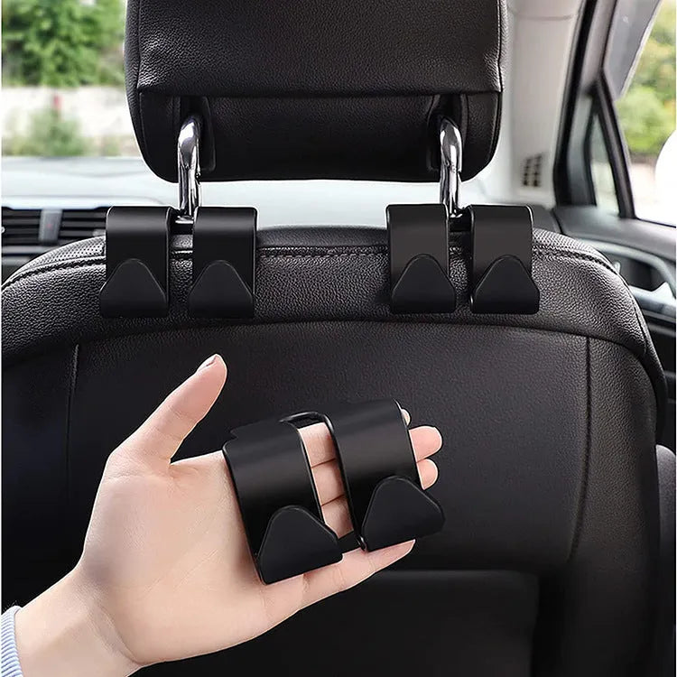 Car seat back hook with mobile phone holder, plastic, in black colour, attached to headrest post