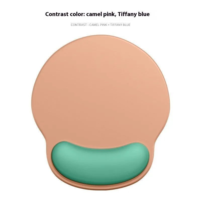 Silicone wristband mouse mat in a gradient colour on a desk